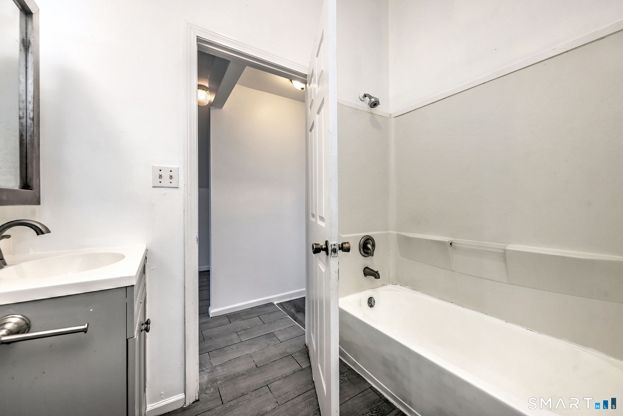 483 Ferry Street, Unit 3 New Haven, CT 06513 - Photo 28 of 28 a bathroom with a tub and a sink