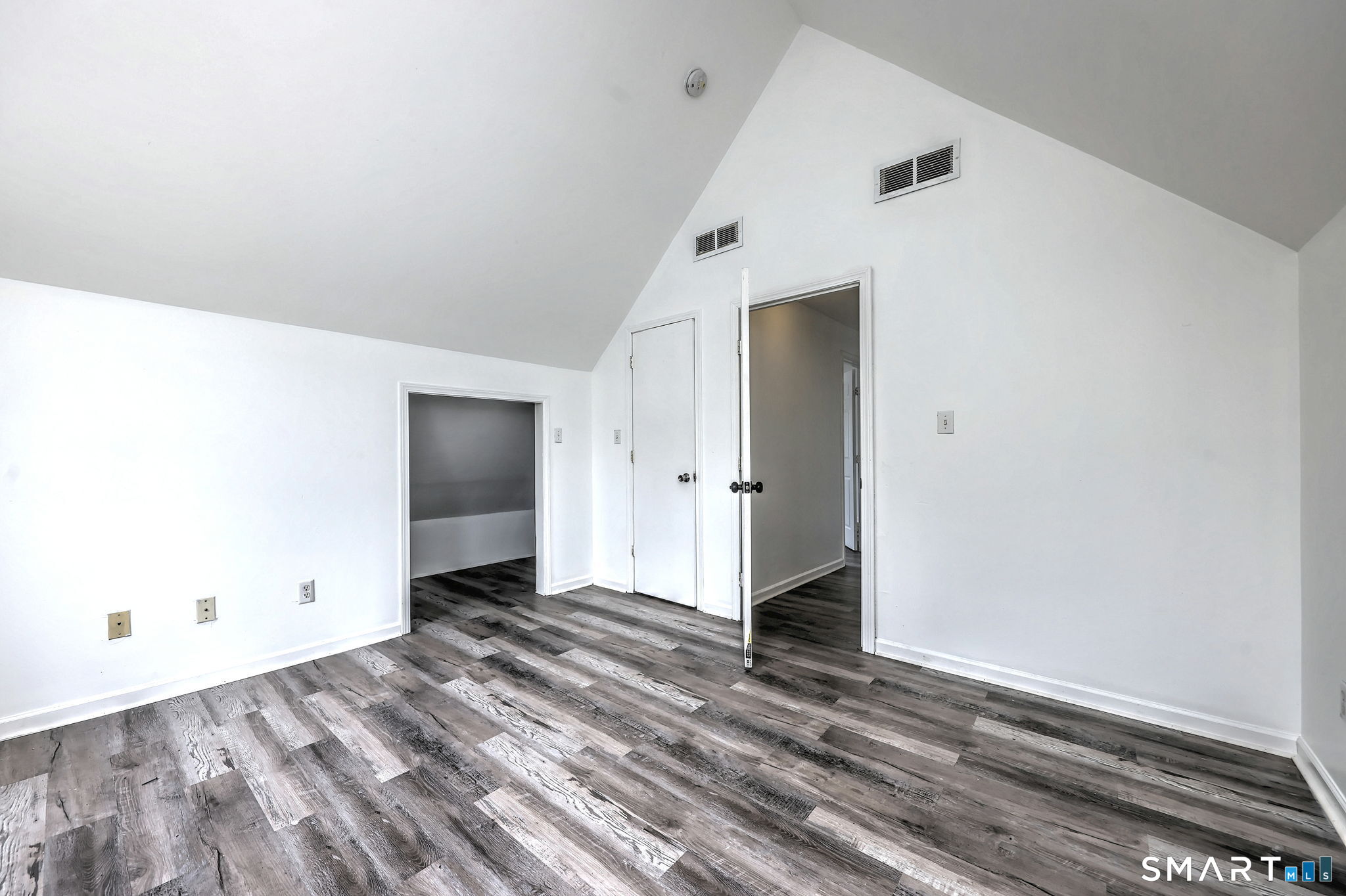 483 Ferry Street, Unit 3 New Haven, CT 06513 - Photo 7 of 28 a view of an empty room with wooden floor