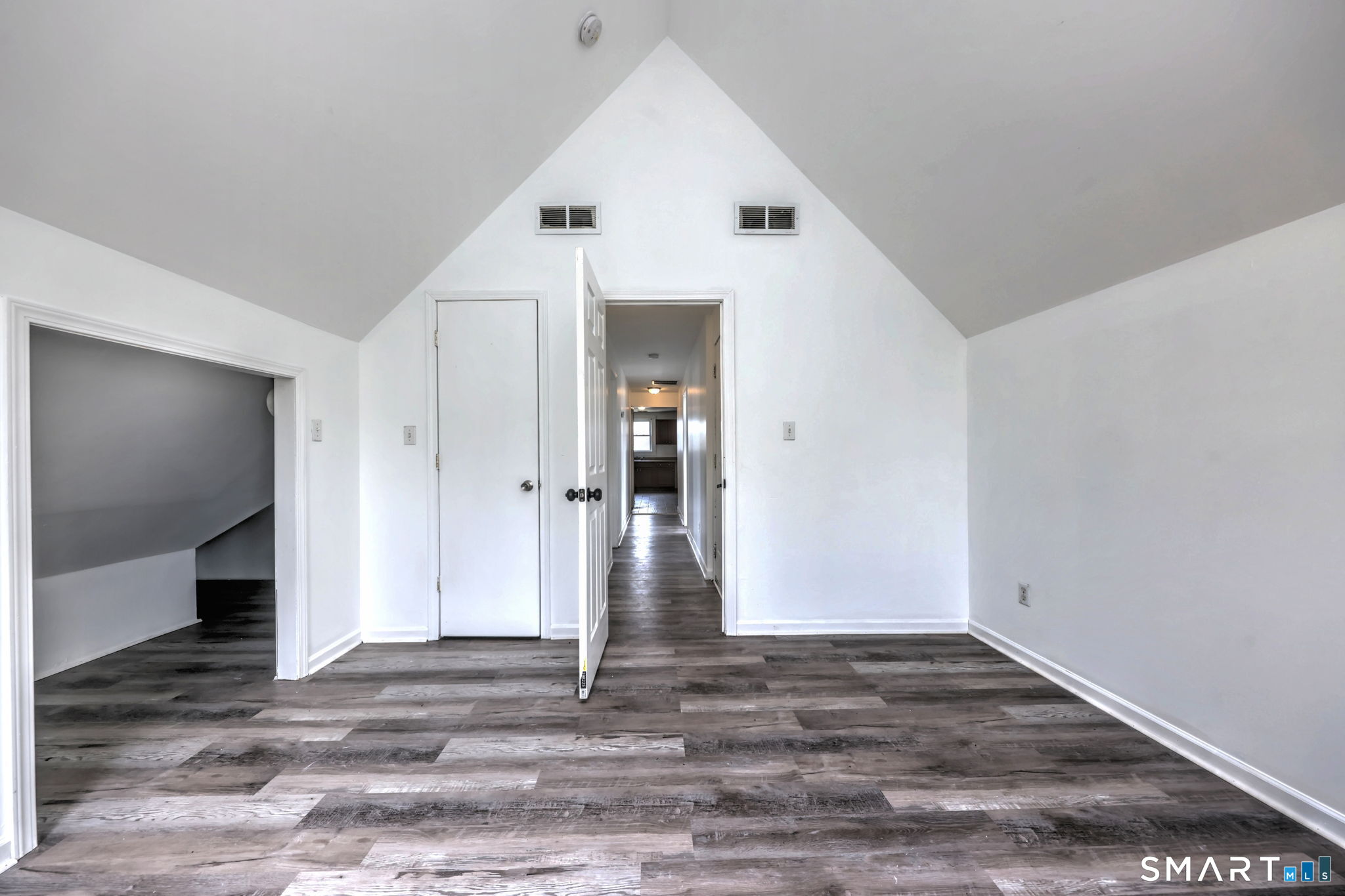 483 Ferry Street, Unit 3 New Haven, CT 06513 - Photo 8 of 28 a view of a hallway with wooden floor and entryway