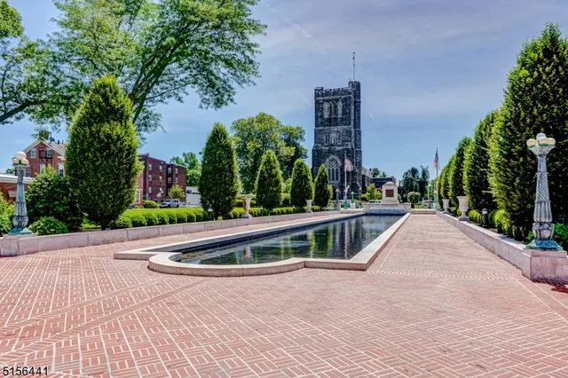 a view of swimming pool from a balcony