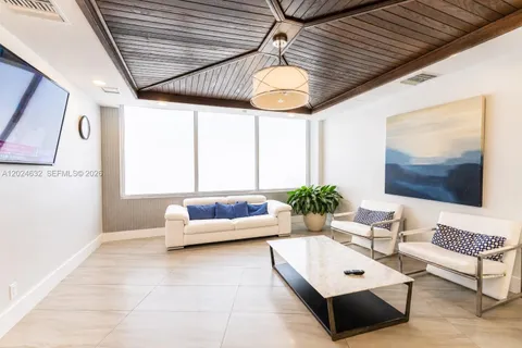 a view of livingroom with furniture and wooden floor