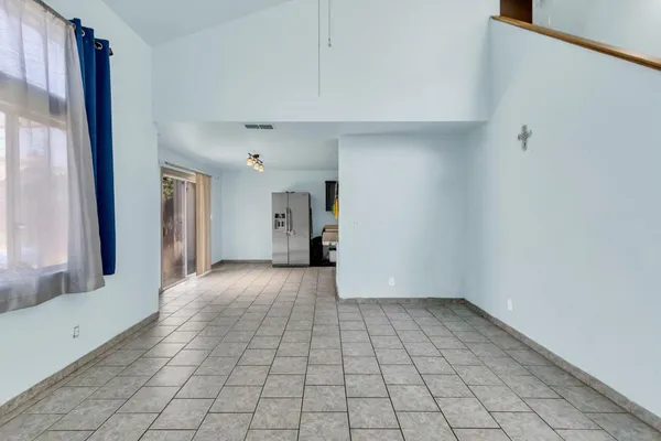 a view of an empty room and window