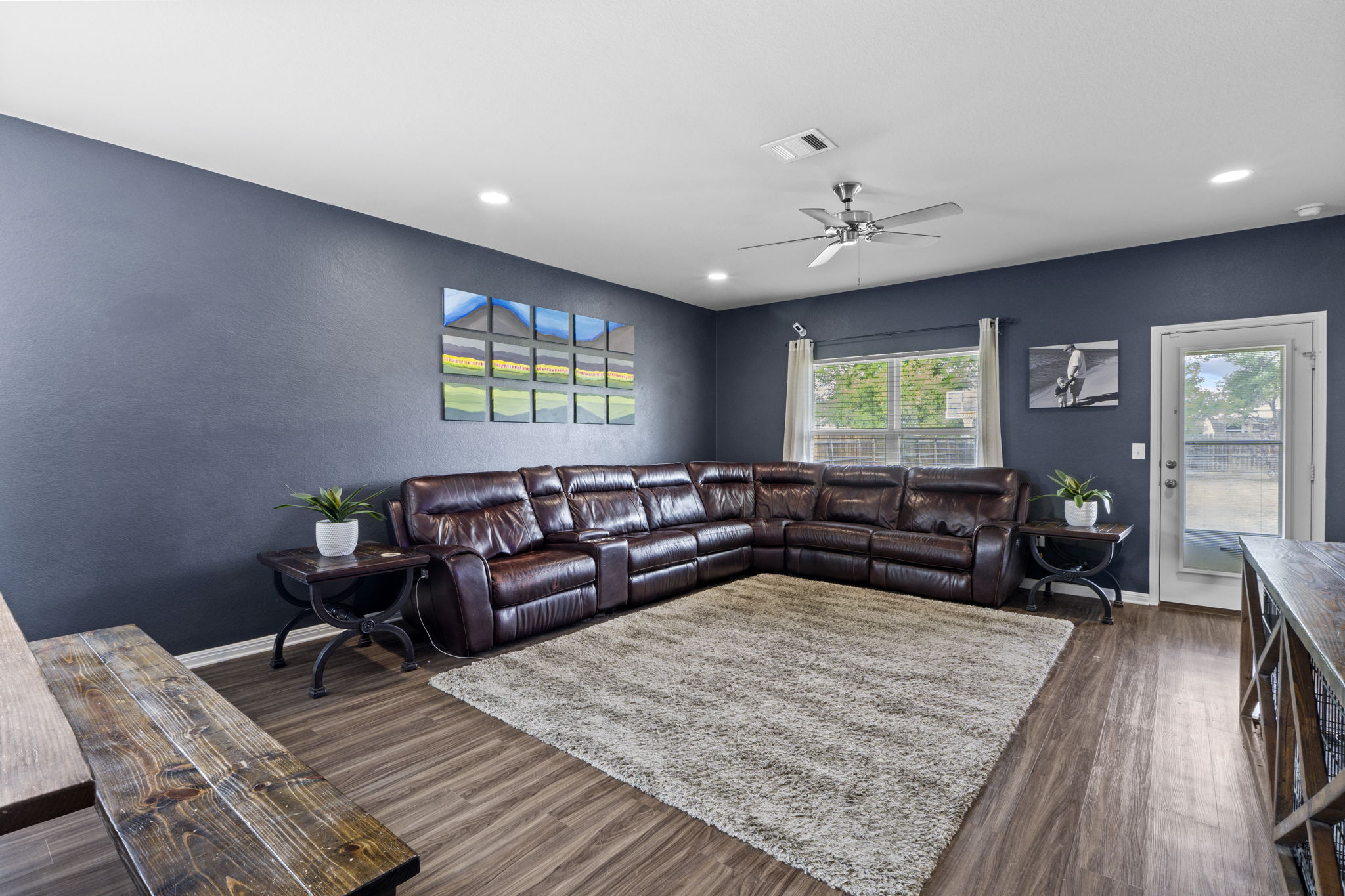 2417 Bridges Ranch Road Georgetown, TX 78628 - Photo 19 of 36 Living room featuring a ceiling fan and dark wood-type flooring