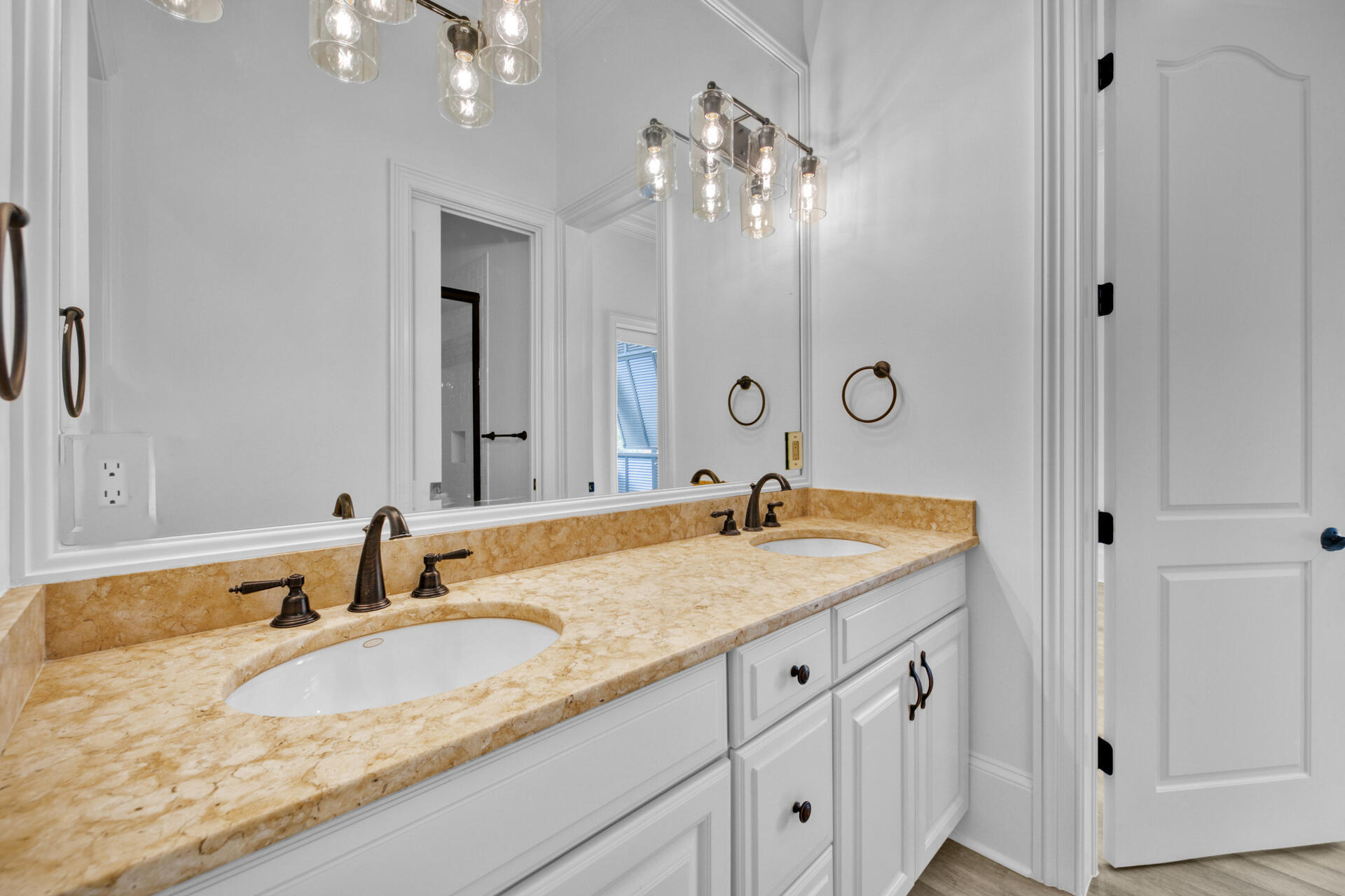 48 Sandstone Street Santa Rosa Beach, FL 32459 - Photo 25 of 78 a bathroom with a granite countertop sink and a mirror