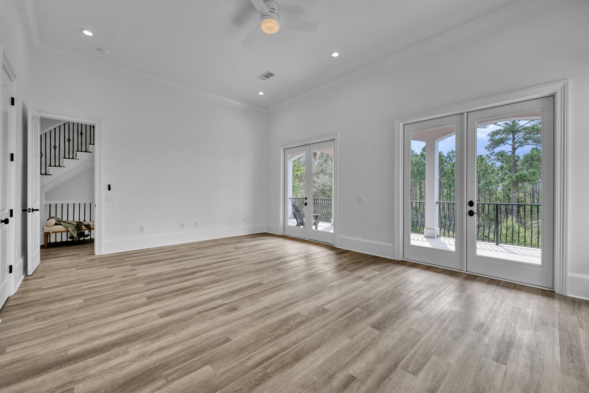 48 Sandstone Street Santa Rosa Beach, FL 32459 - Photo 30 of 78 a view of an empty room with wooden floor and a window