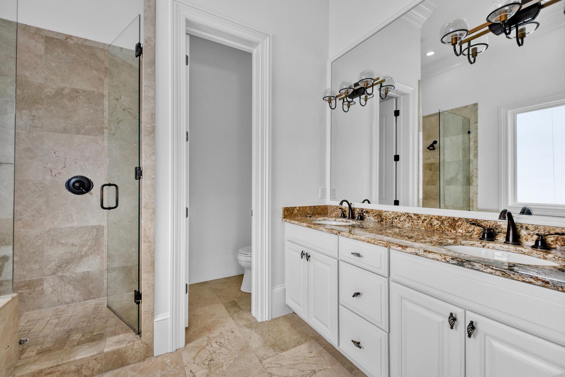 48 Sandstone Street Santa Rosa Beach, FL 32459 - Photo 34 of 78 a bathroom with a granite countertop sink two mirror and shower