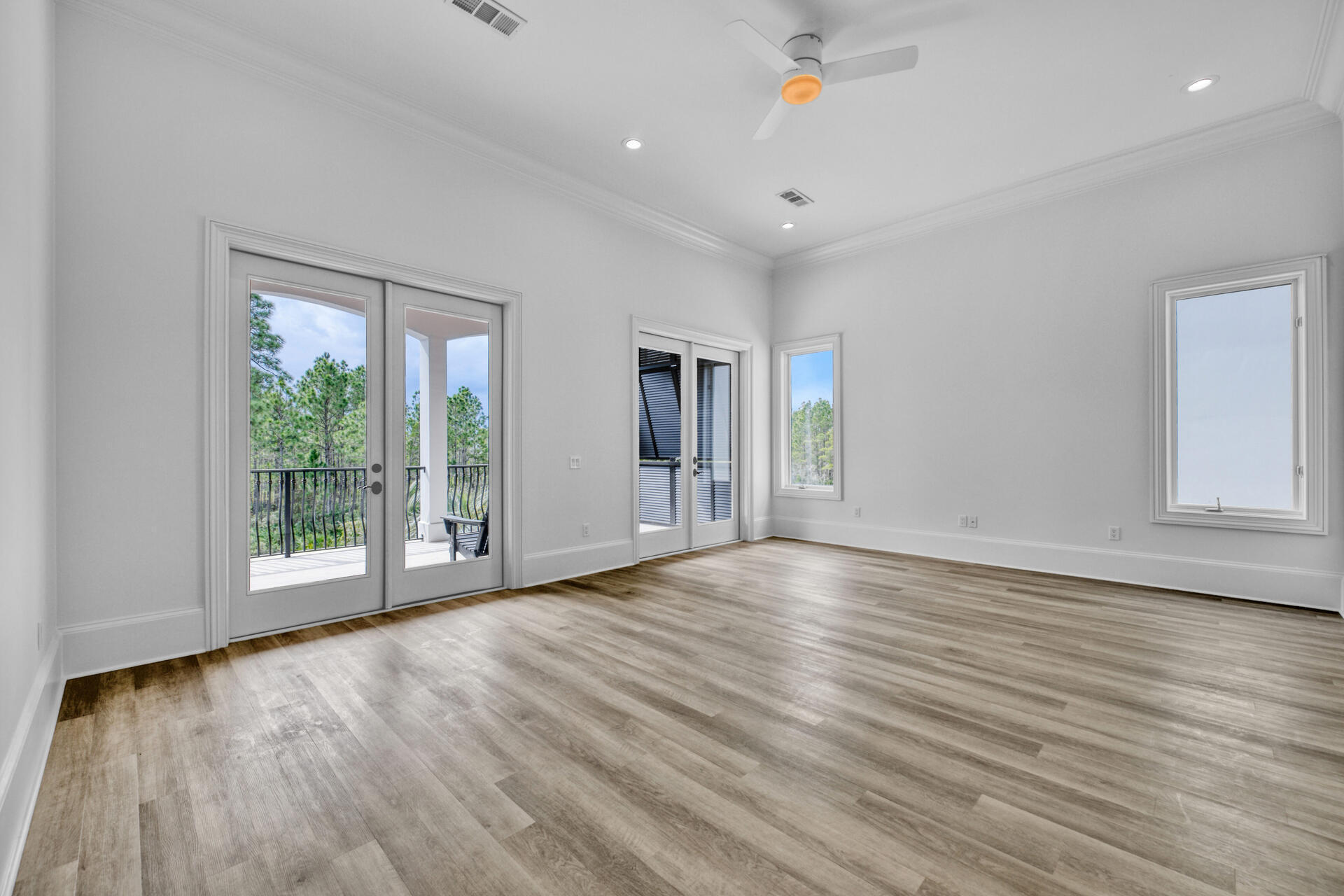48 Sandstone Street Santa Rosa Beach, FL 32459 - Photo 35 of 78 a view of an empty room with wooden floor and a window
