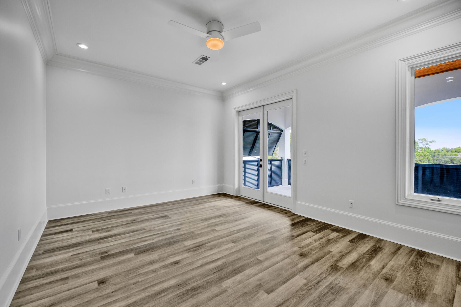 48 Sandstone Street Santa Rosa Beach, FL 32459 - Photo 41 of 78 wooden floor in an empty room with a window
