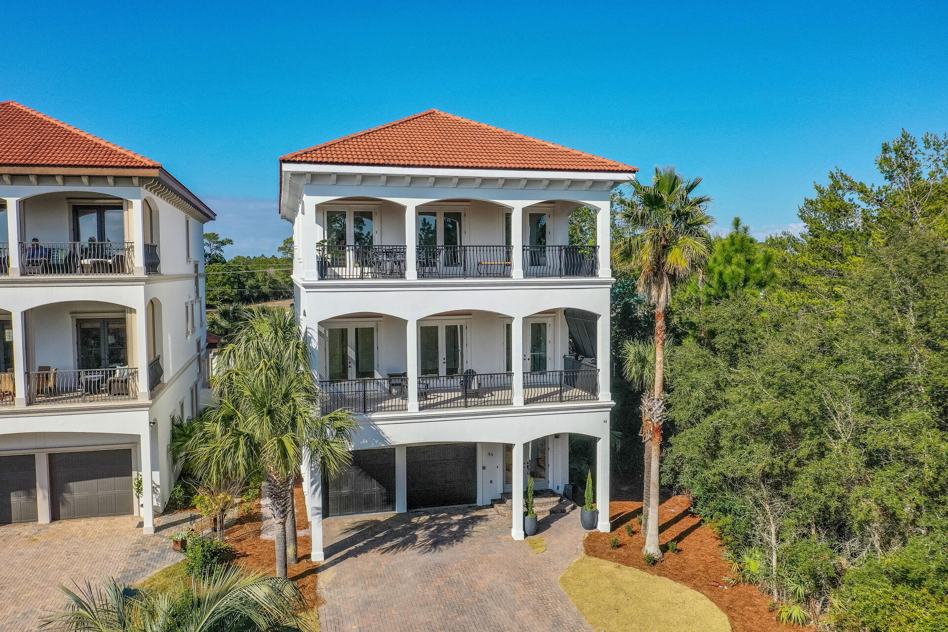 48 Sandstone Street Santa Rosa Beach, FL 32459 - Photo 71 of 78 a front view of a house with a yard