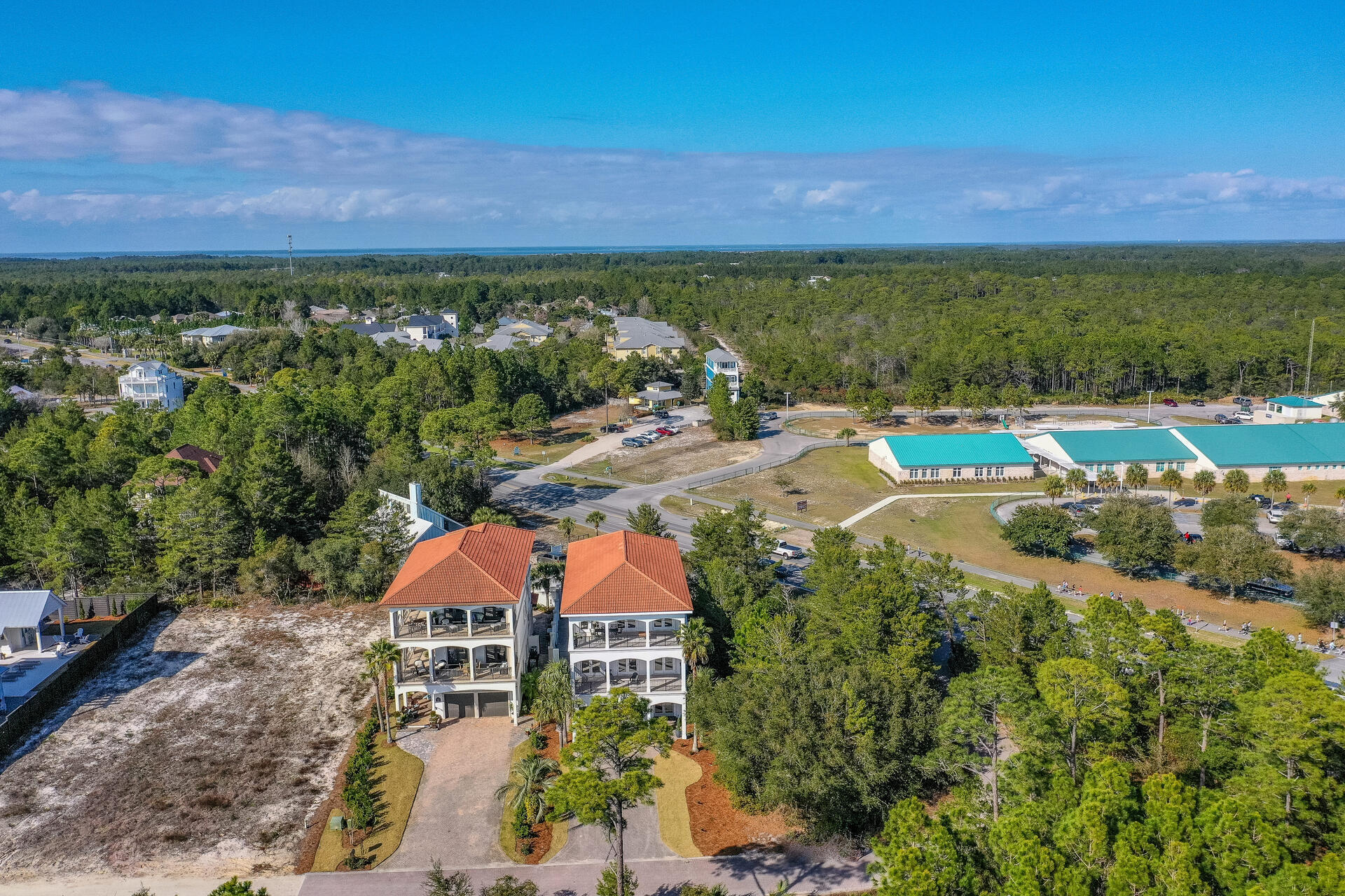 48 Sandstone Street Santa Rosa Beach, FL 32459 - Photo 72 of 78 an aerial view of residential houses with outdoor space and lake view