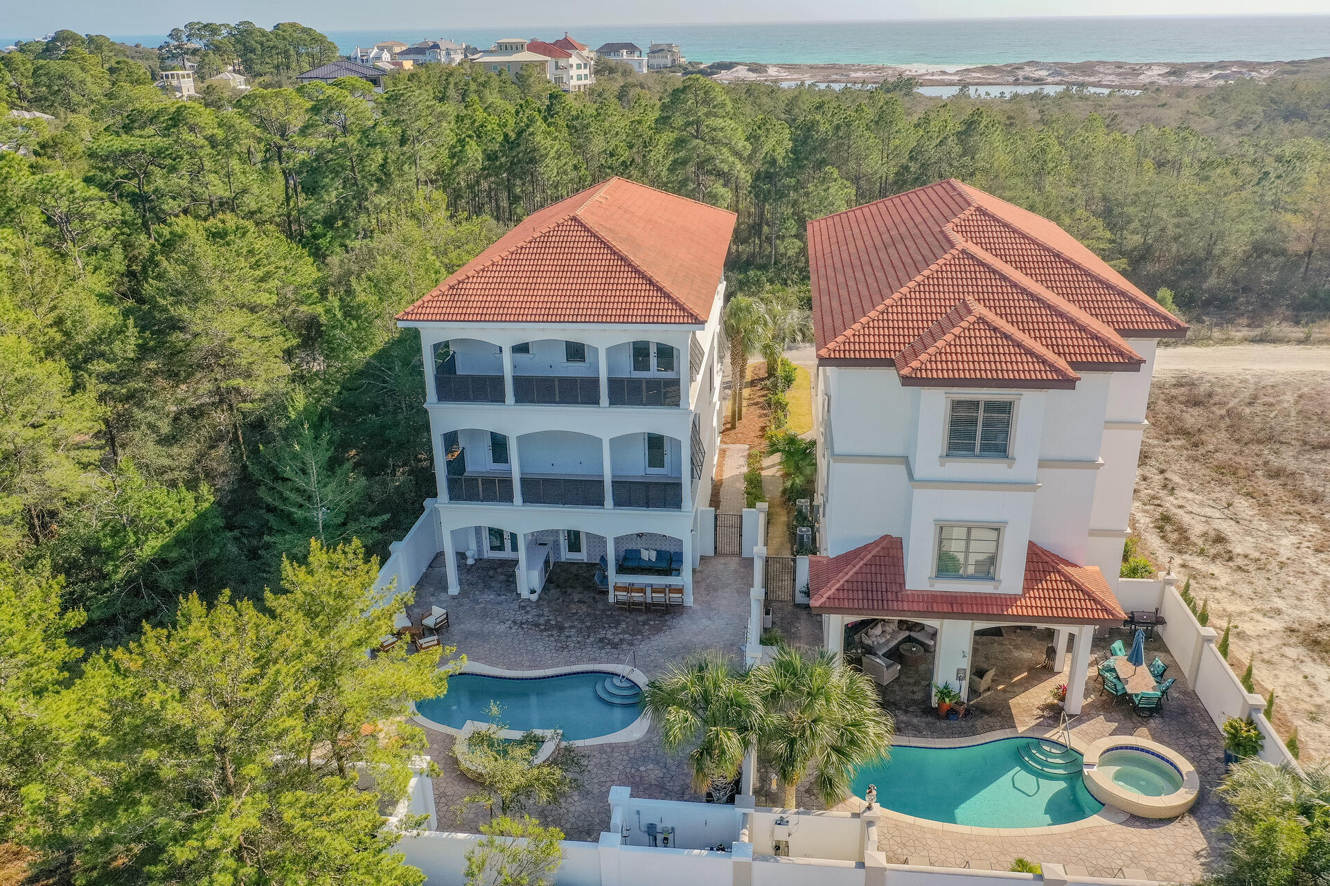 48 Sandstone Street Santa Rosa Beach, FL 32459 - Photo 74 of 78 an aerial view of a house with garden space and sitting area