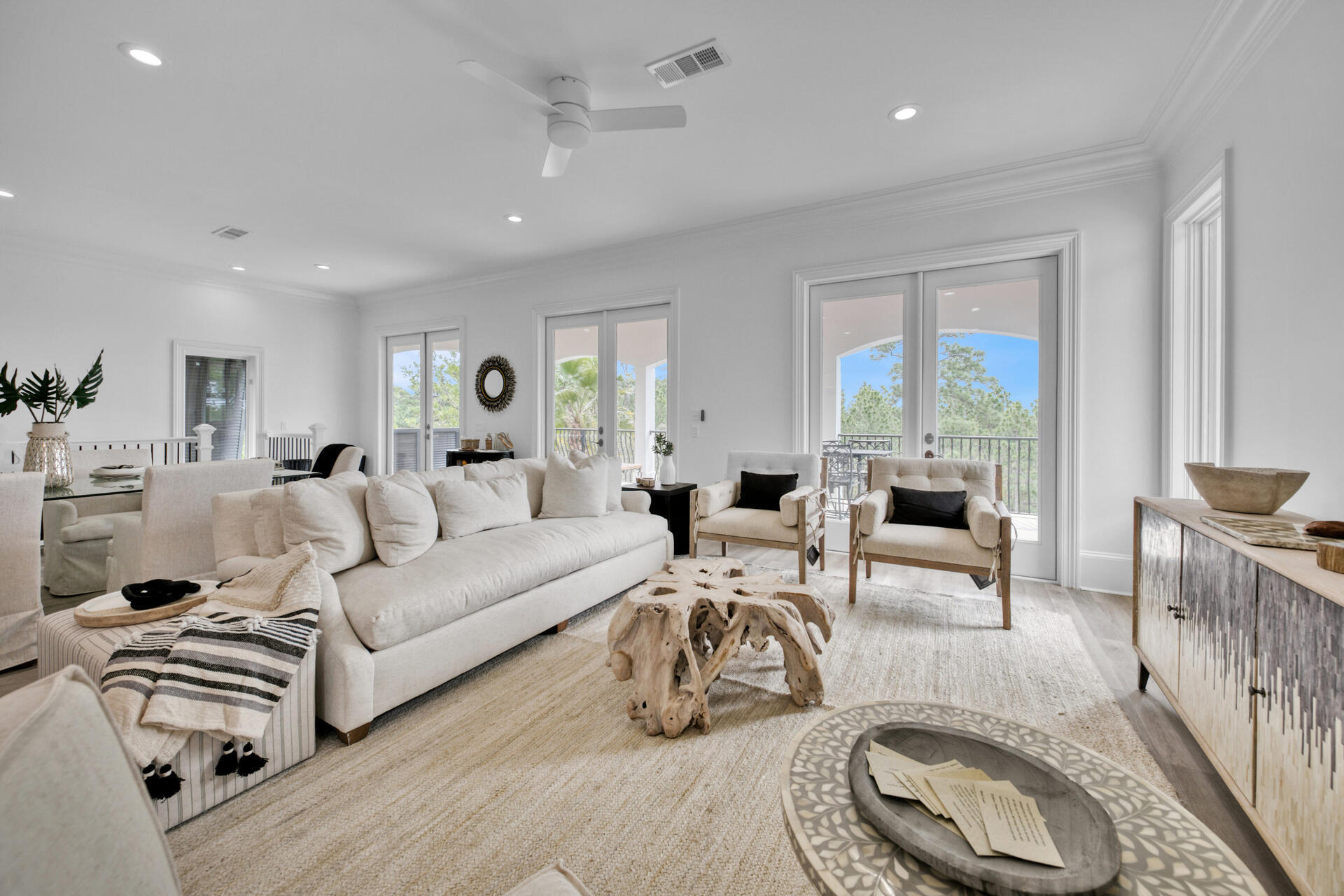 48 Sandstone Street Santa Rosa Beach, FL 32459 - Photo 9 of 78 a living room with furniture fireplace and a table