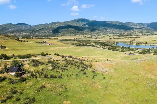 a view of an ocean and a mountain