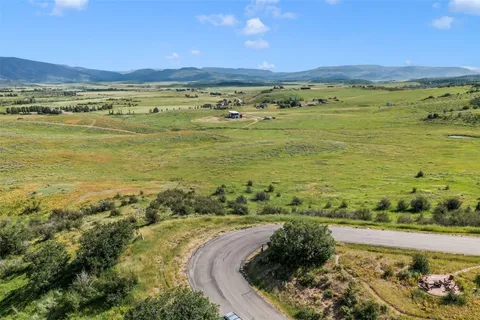 a view of an ocean and mountain