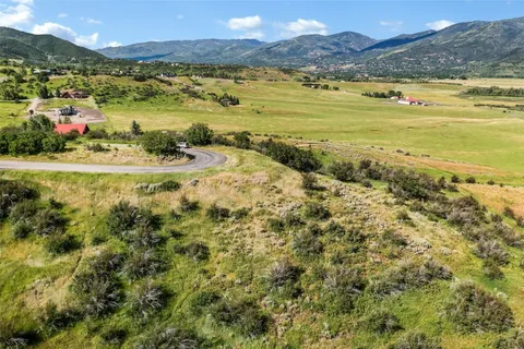a view of an ocean and a mountain