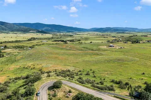 a view of an ocean and a mountain
