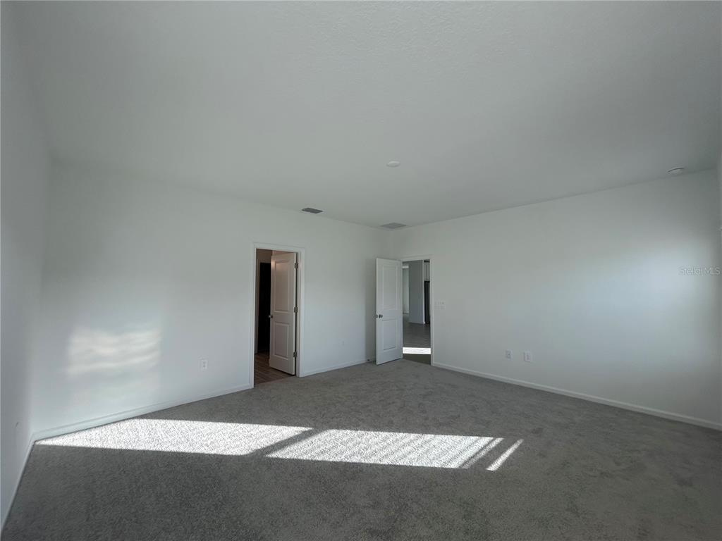 12419 Northwest 139th Court Alachua, FL 32615 - Photo 14 of 38 a view of an empty room