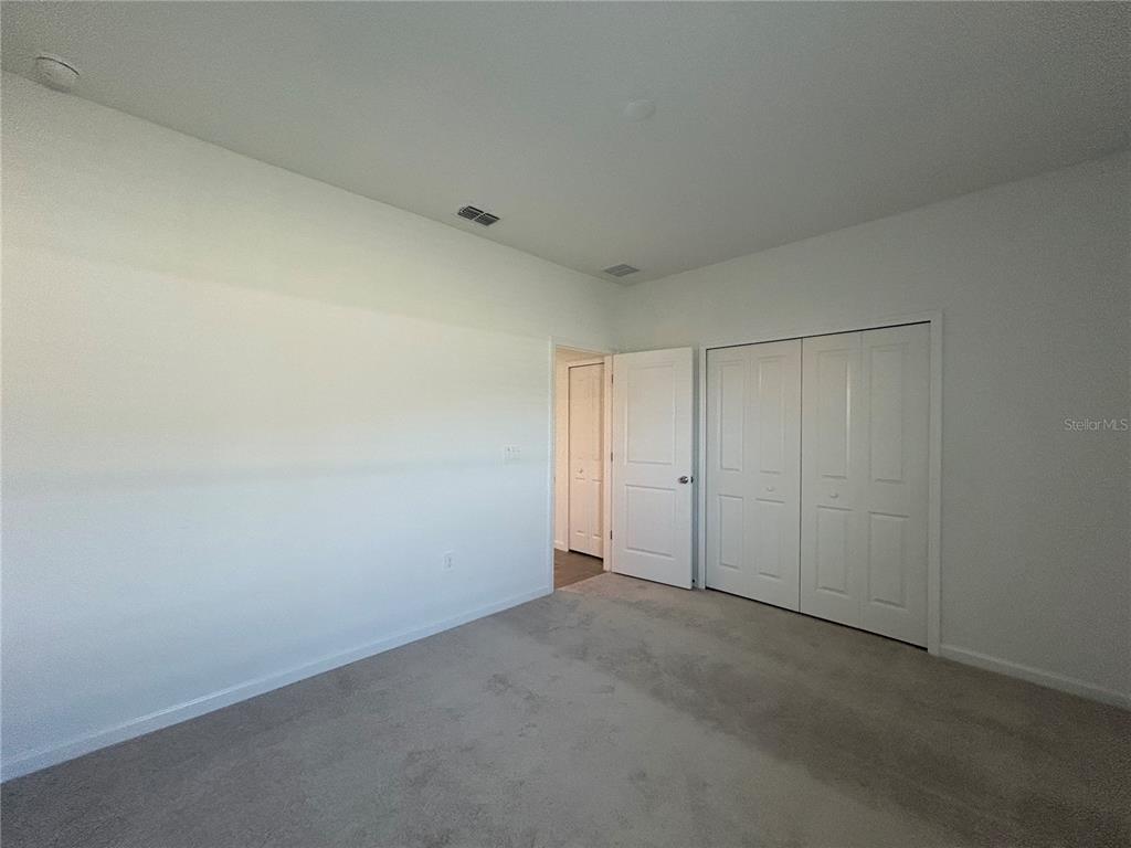 12419 Northwest 139th Court Alachua, FL 32615 - Photo 29 of 38 a view of an empty room
