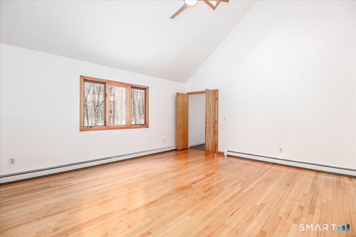 8 Pebble Lane New Milford, CT 06776 - Photo 13 of 44 an empty room with window