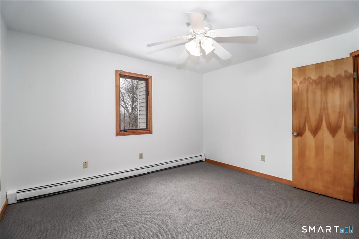 8 Pebble Lane New Milford, CT 06776 - Photo 27 of 44 an empty room with a window