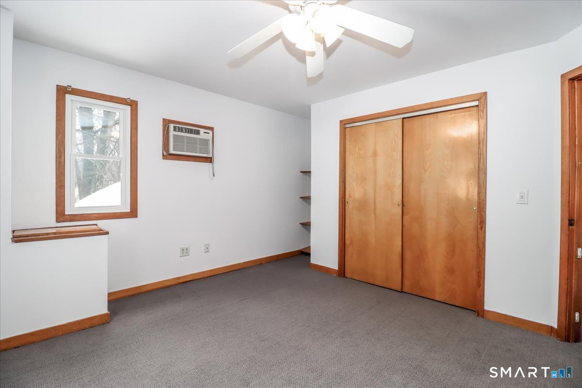 8 Pebble Lane New Milford, CT 06776 - Photo 30 of 44 a view of an empty room with a window