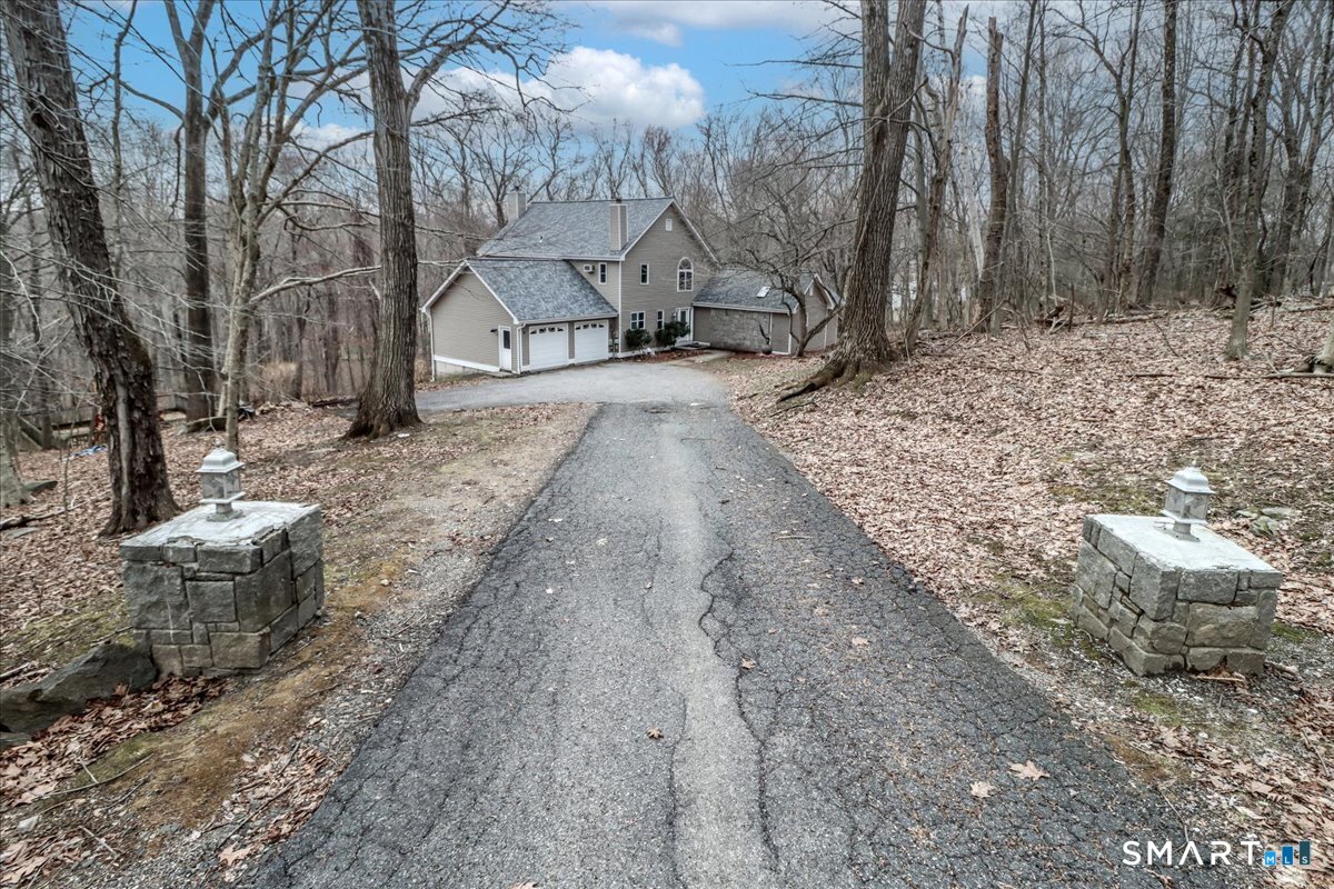 8 Pebble Lane New Milford, CT 06776 - Photo 3 of 44 a view of outdoor space with wooden fence