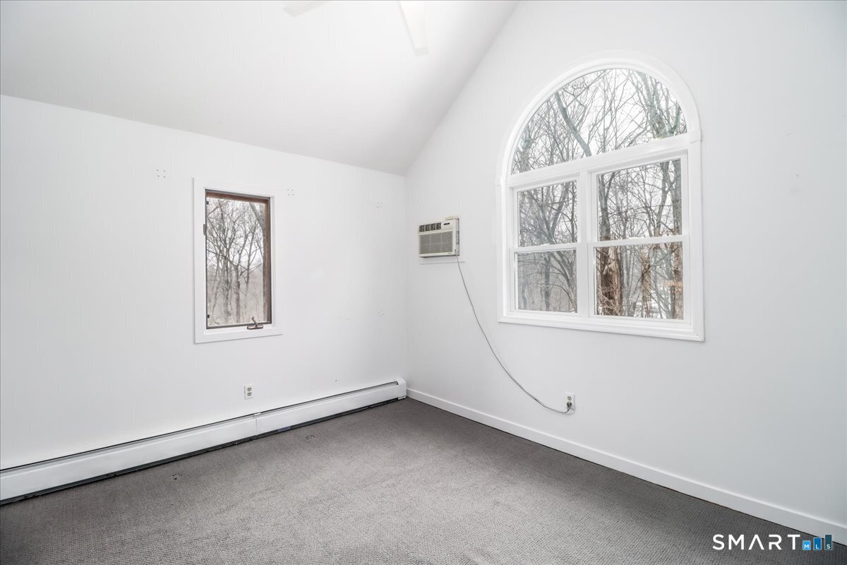 8 Pebble Lane New Milford, CT 06776 - Photo 32 of 44 an empty room with a window