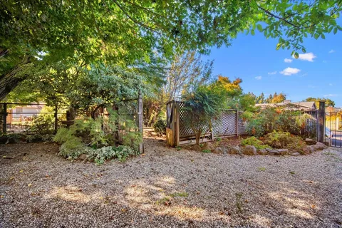 a backyard of a house with lots of green space