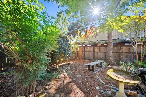 a backyard of a house with lots of green space