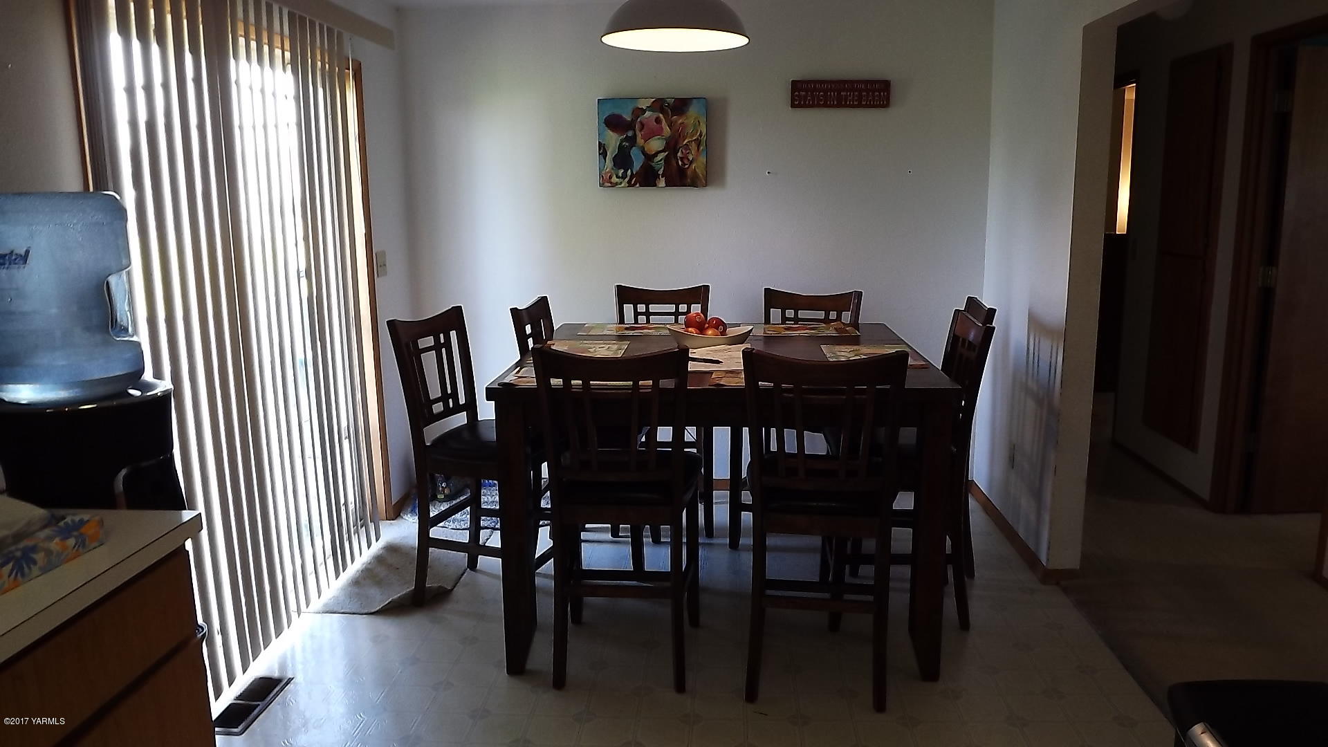 8401 North Missimer Road Prosser, WA 99350 - Photo 6 of 13 a view of a dining room with furniture and window