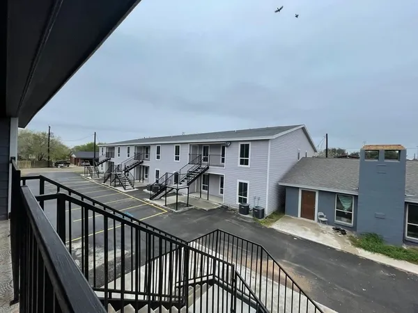 a view of a house with a patio