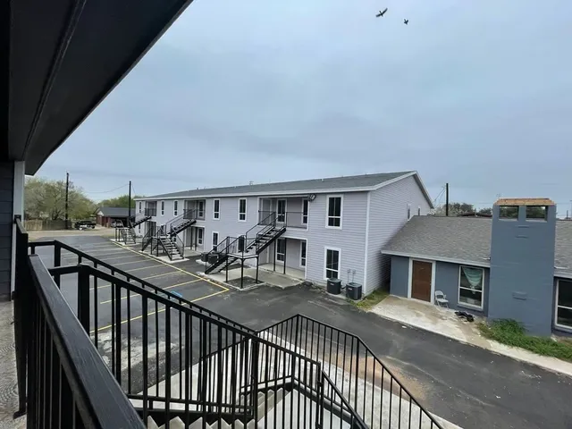 a view of a house with a patio