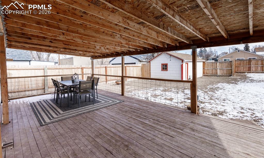 548 Denver Street Calhan, CO 80808 - Photo 32 of 40 a view of a patio with wooden floor
