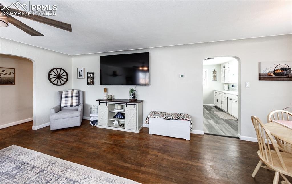 548 Denver Street Calhan, CO 80808 - Photo 7 of 40 a living room with furniture and a flat screen tv