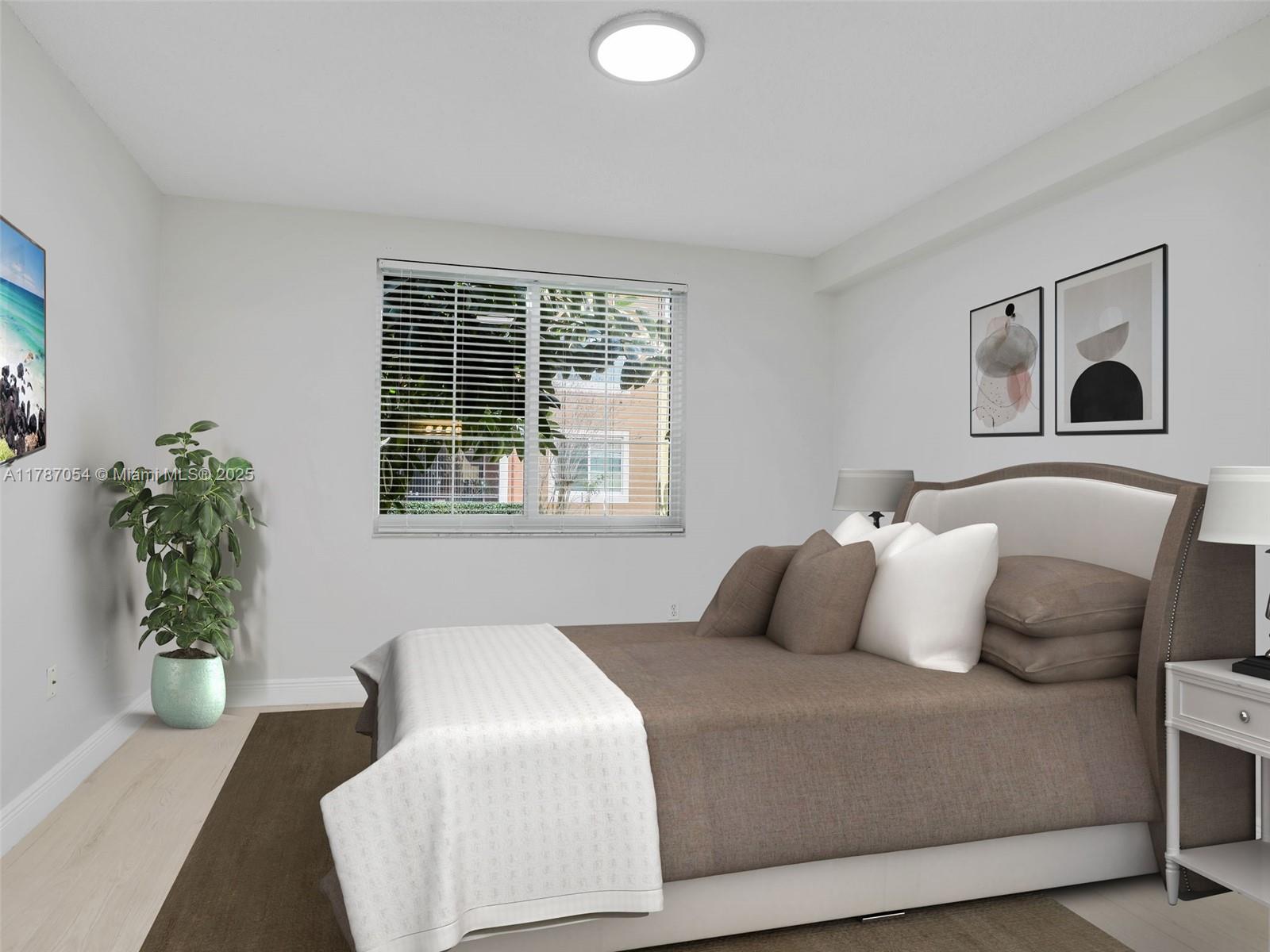 1235 Reserve Way, Unit 5107 Naples, FL 34105 - Photo 11 of 27 a bedroom with bed and a window