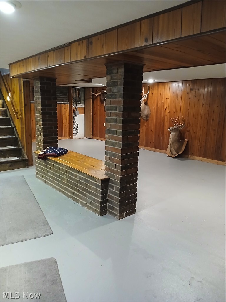 13872 Patch Road Burton, OH 44021 - Photo 25 of 33 Basement with brick wall and wooden walls