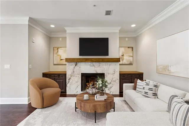 a view of kitchen with stainless steel appliances refrigerator oven microwave and stove