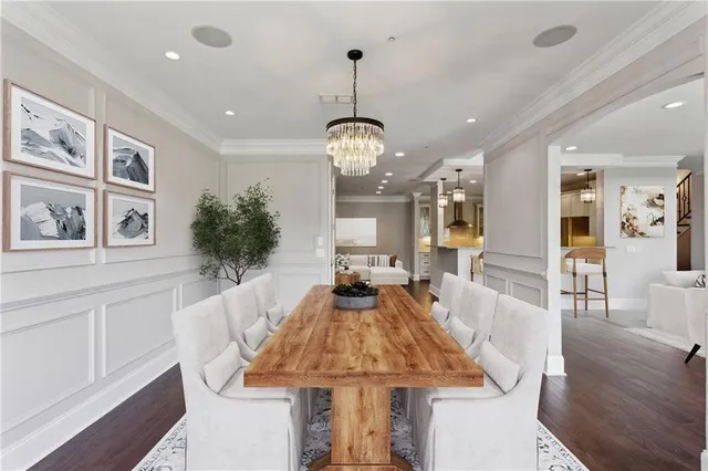 a bathroom with a granite countertop sink a toilet and a mirror