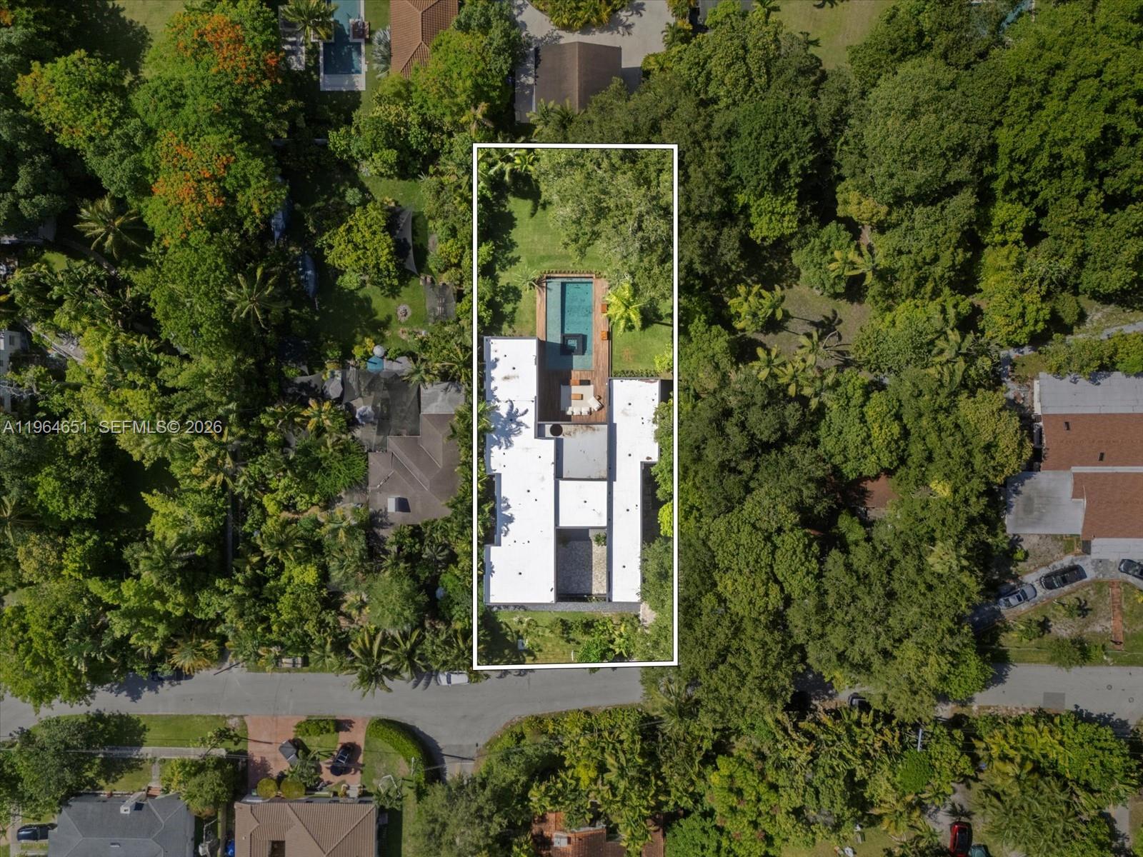 871 Northeast 83rd Street Miami, FL 33138 - Photo 11 of 54 an aerial view of a house