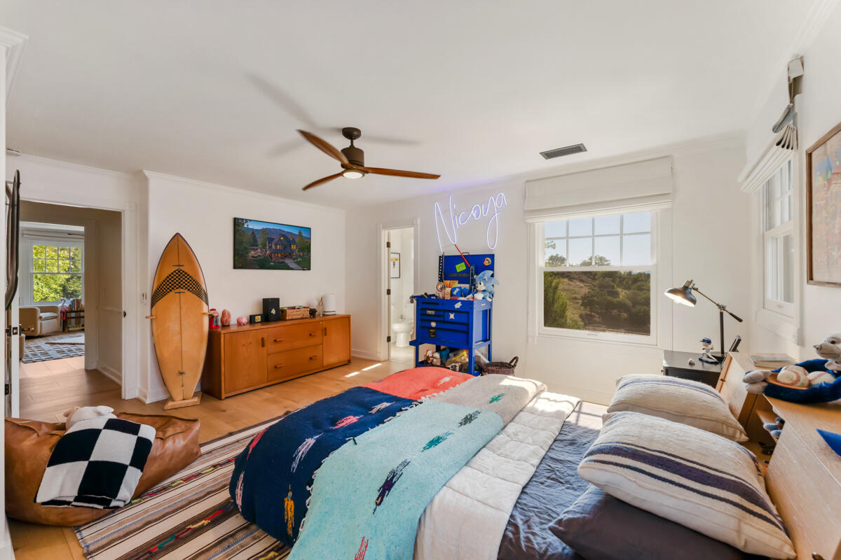13100 Ojai Road Santa Paula, CA 93060 - Photo 29 of 60 a bed room with a bed and furniture