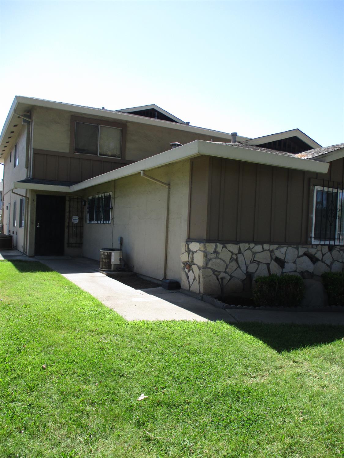 434 East Bianchi Road, Unit 3 Stockton, CA 95207 - Photo 1 of 1 a backyard of a house with lots of green space
