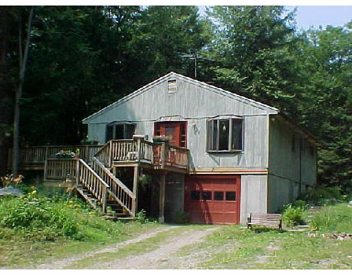 1680 Main Poland Road Conway, MA 01341 - Photo 1 of 1 a front view of a house with a yard
