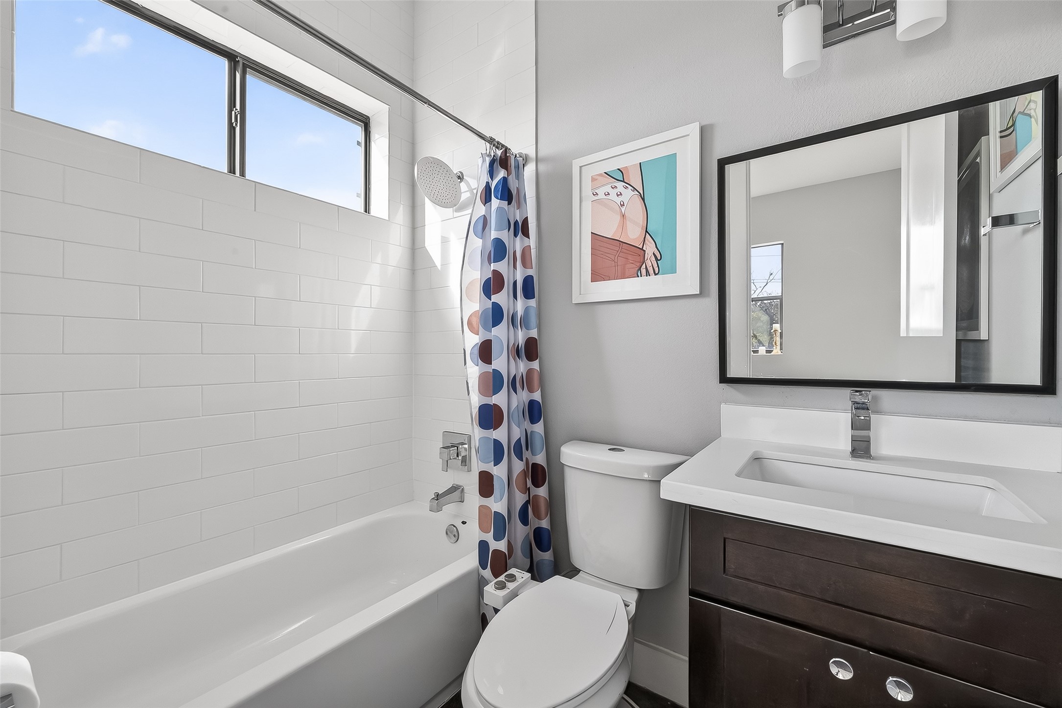606 Pacific Street Houston, TX 77006 - Photo 27 of 41 a bathroom with a sink toilet and shower