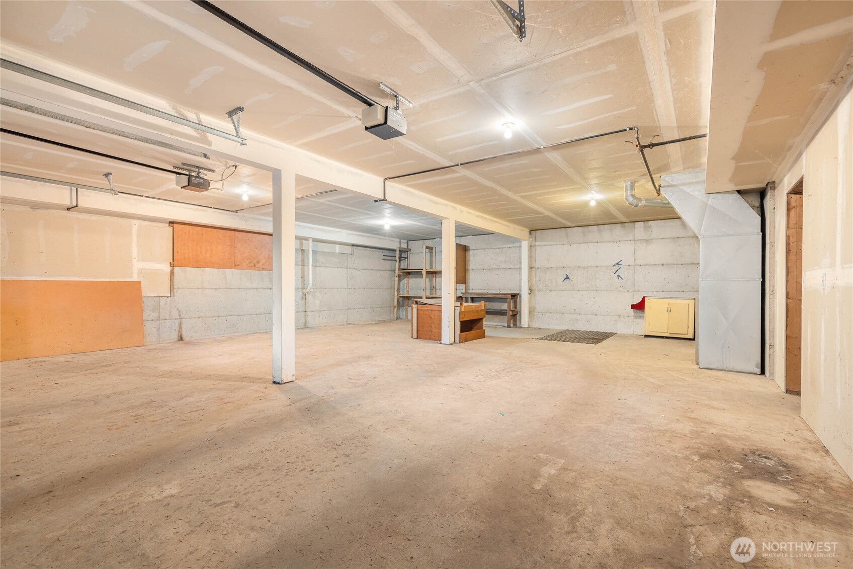 14638 Gibralter Road Anacortes, WA 98221 - Photo 16 of 25 a view of empty room with wooden floor