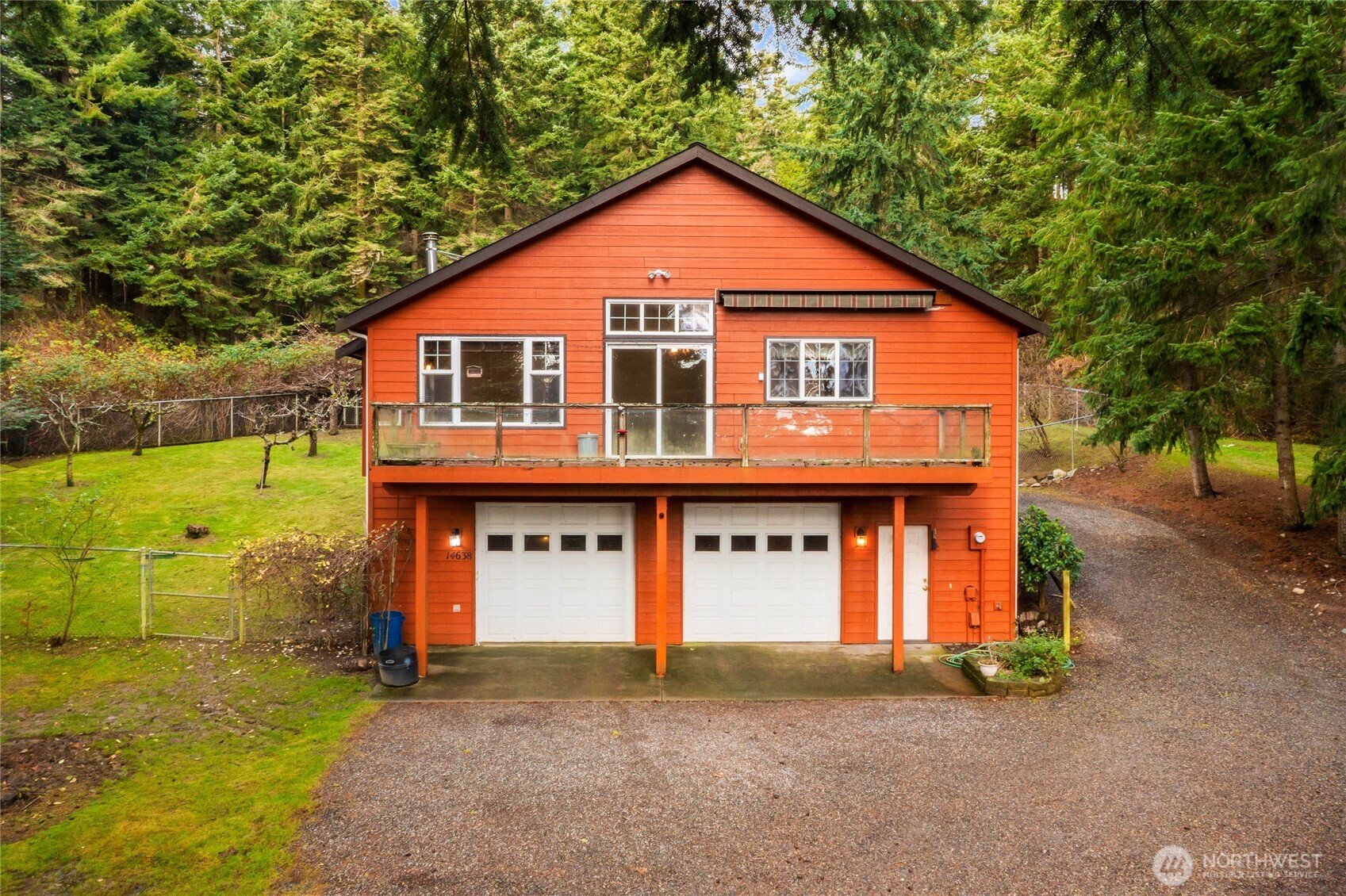 14638 Gibralter Road Anacortes, WA 98221 - Photo 24 of 25 a front view of a house with a yard