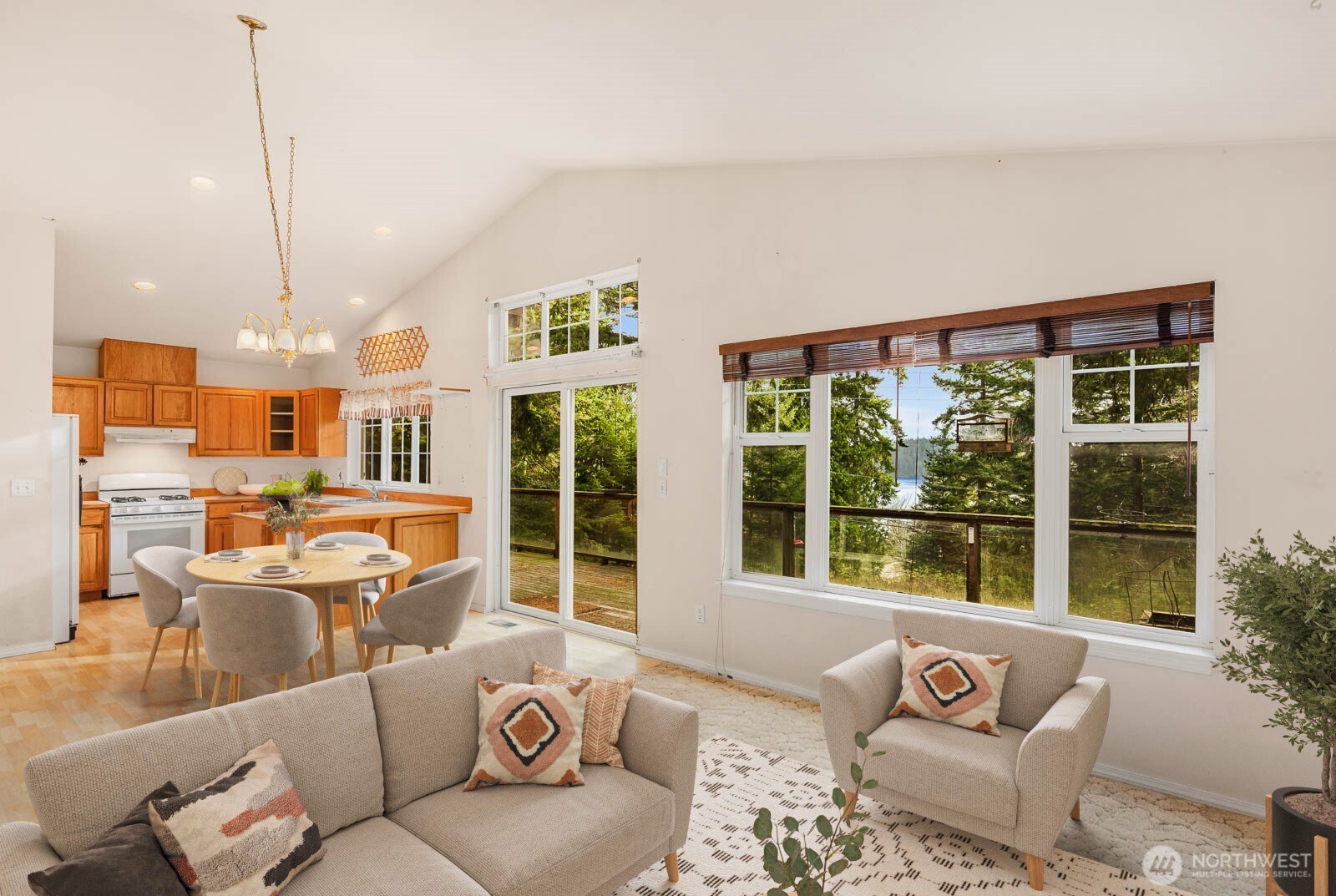 14638 Gibralter Road Anacortes, WA 98221 - Photo 7 of 25 a living room with furniture and floor to ceiling windows