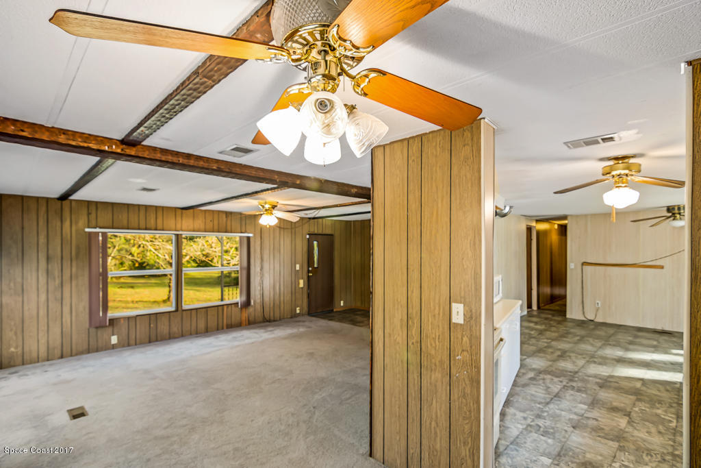 4510 Hog Valley Road Mims, FL 32754 - Photo 23 of 39 Living room and kitchen
