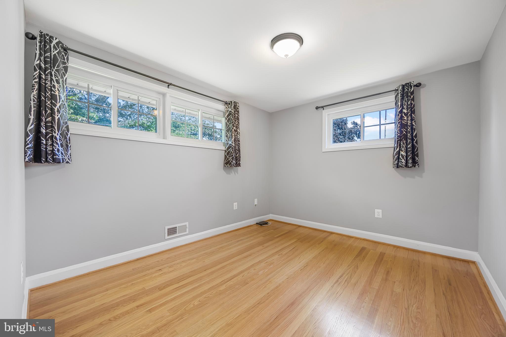 1305 Heather Hill Road Baltimore, MD 21239 - Photo 24 of 50 Bedroom with wooden floors