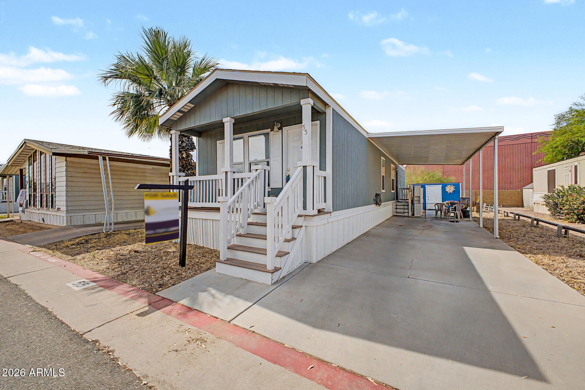 625 West McKellips Road, Unit 55 Mesa, AZ 85201 - Photo 2 of 21 a view of a house with garage