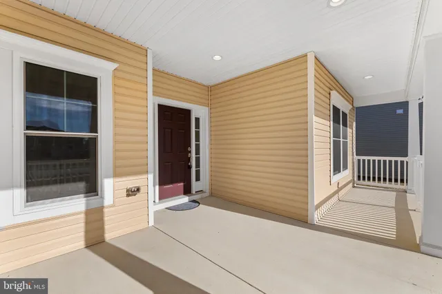 a view of a house with a door and a window